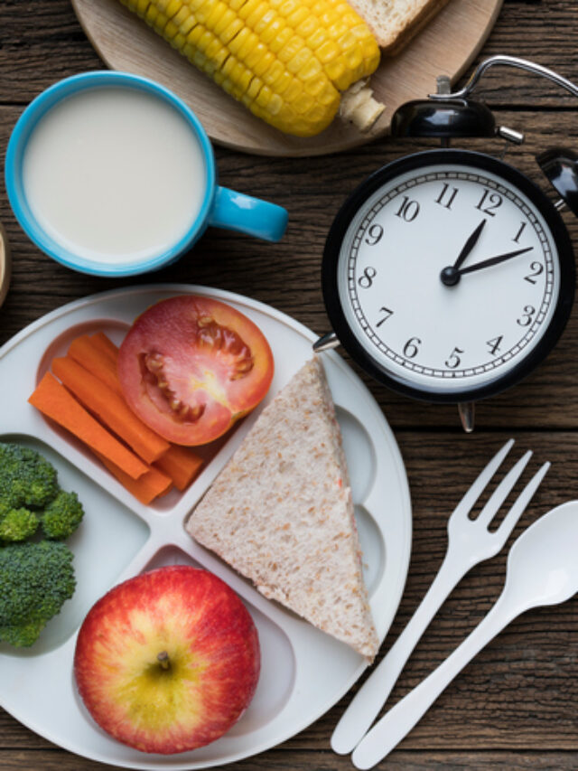 Meal time with alarm clock at lunch time